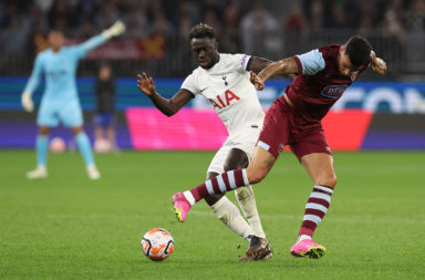 Davinson Sanchez challenges for the ball